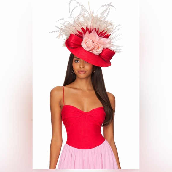 Won’t last!  Pink and red Fascinator.  Jana’s Hat Box